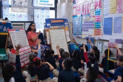 Neag School student leading a class at Kennelly Elementary School.